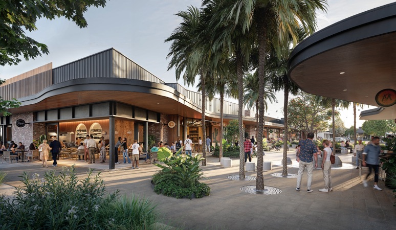 A rendered architectural visualisation of an open-air shopping precinct featuring warm timber and stone-clad shopfronts, lush tropical landscaping with tall palm trees, and groups of people walking and dining in an alfresco setting under a late afternoon sky.